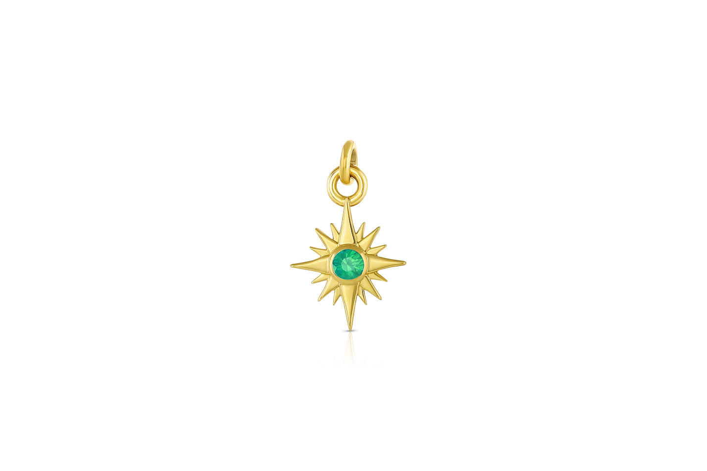 18k yellow gold star charm with emerald center stone on white background.