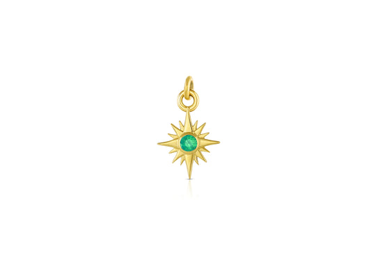 18k yellow gold star charm with emerald center stone on white background.