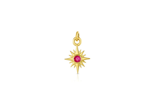 Load image into Gallery viewer, 18k yellow gold star charm with ruby center stone on white background.
