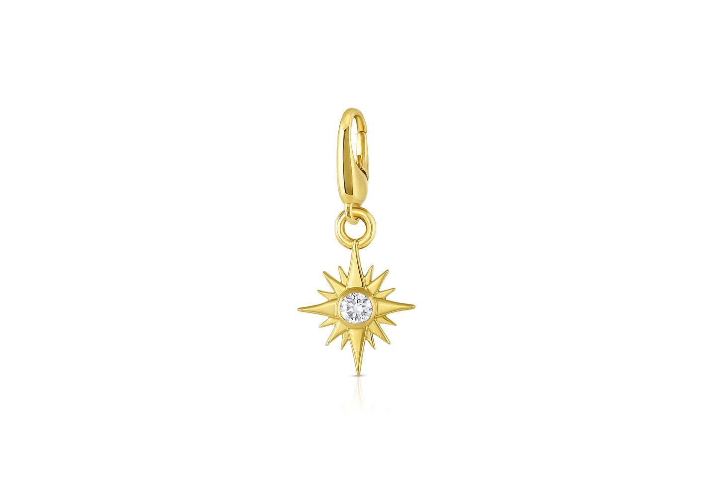 18k yellow gold star charm with diamond center stone on white background.