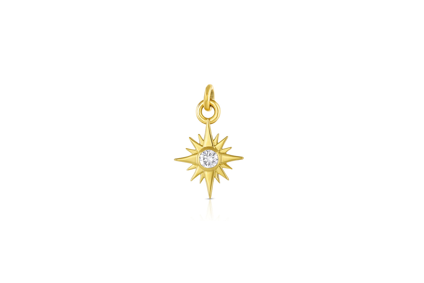 18k yellow gold star charm with diamond center stone on white background.
