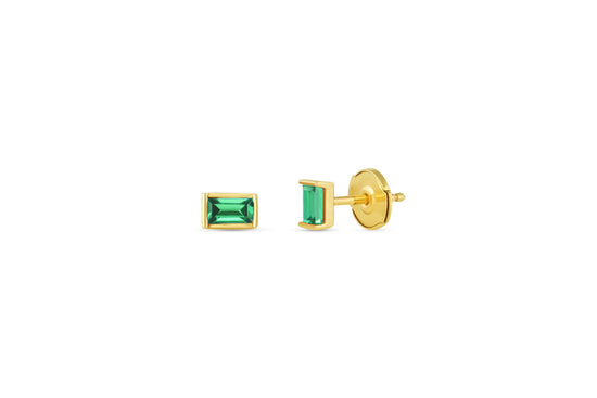 Load image into Gallery viewer, baguette shaped emerald stud earrings on white background.

