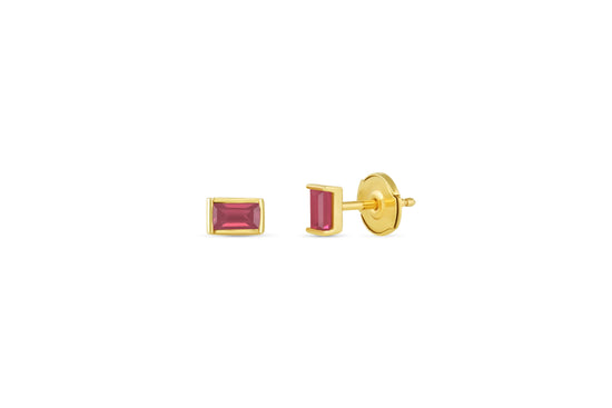Load image into Gallery viewer, baguette shaped ruby stud earrings on white background.
