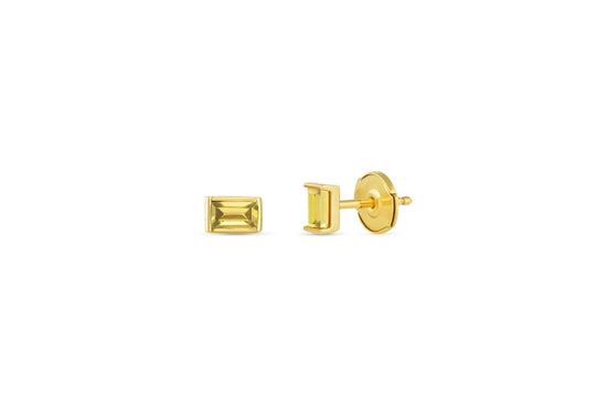 baguette shaped yellow sapphire stud earrings on white background.