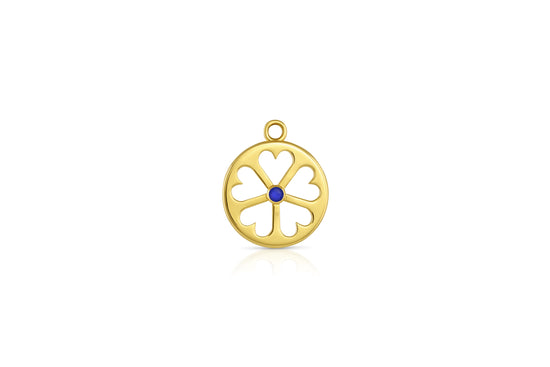 Load image into Gallery viewer, 18k yellow gold circle pendant with heart cut outs and lapis center stone on white background.
