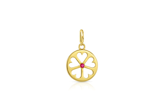 18k yellow gold circle pendant with heart cut outs and ruby center stone on white background.
