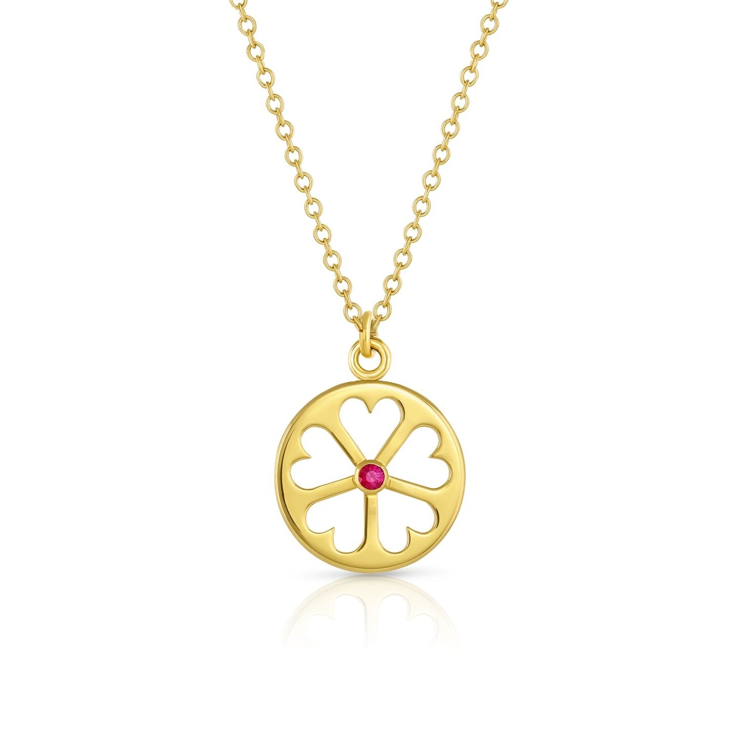 Load image into Gallery viewer, 18k yellow gold circle pendant on chain with heart cut outs and ruby center stone on white background.
