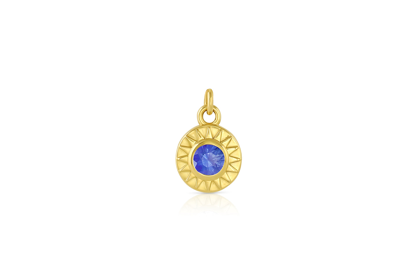 18k yellow gold sunburst circle pendant with blue sapphire center stone.