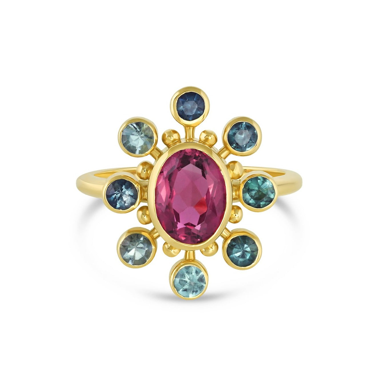 18k yellow gold cosmos ring with pink tourmaline center stone and teal tourmaline and gold halo on white background.