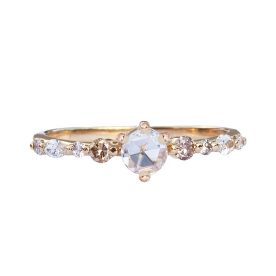 Rose cut diamond ring with champagne and white diamonds on 14k gold band, on white background.