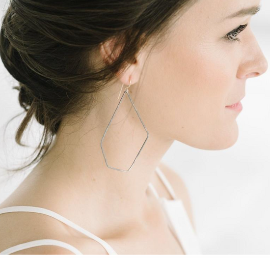 hoop earrings on a model