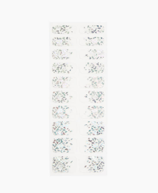 Load image into Gallery viewer, Silver holographic design nail wraps on white background.
