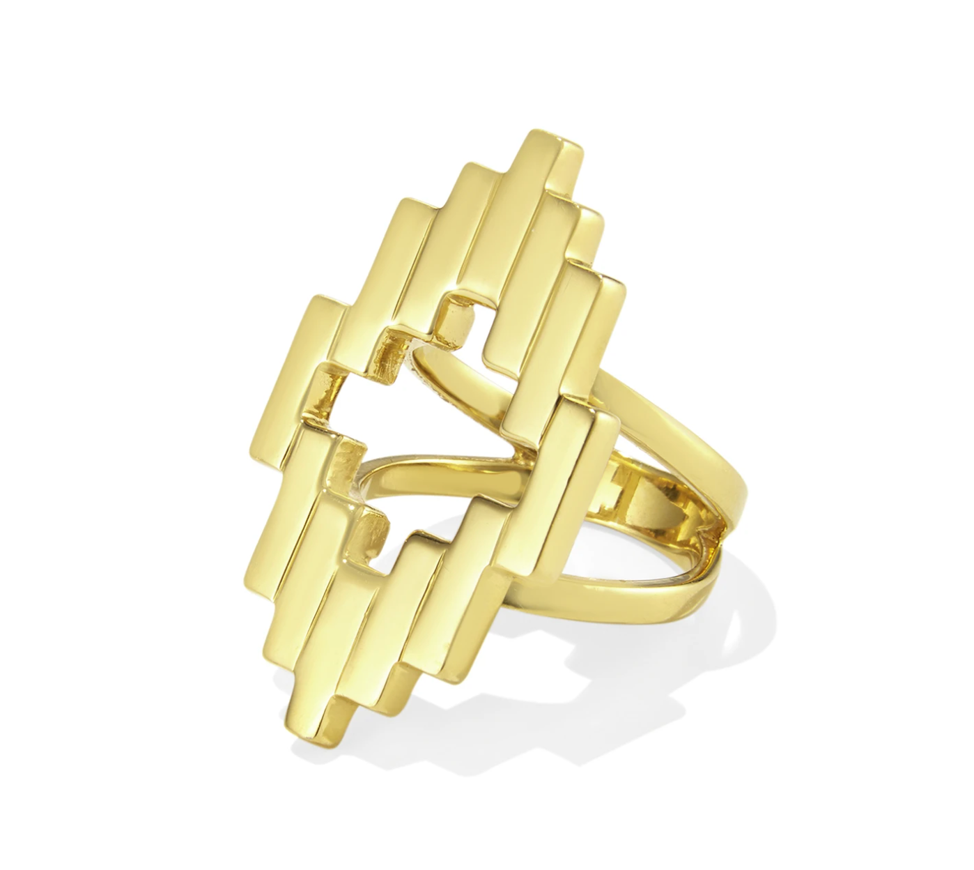 gold plated silver giametric ring pictured in front of a white background