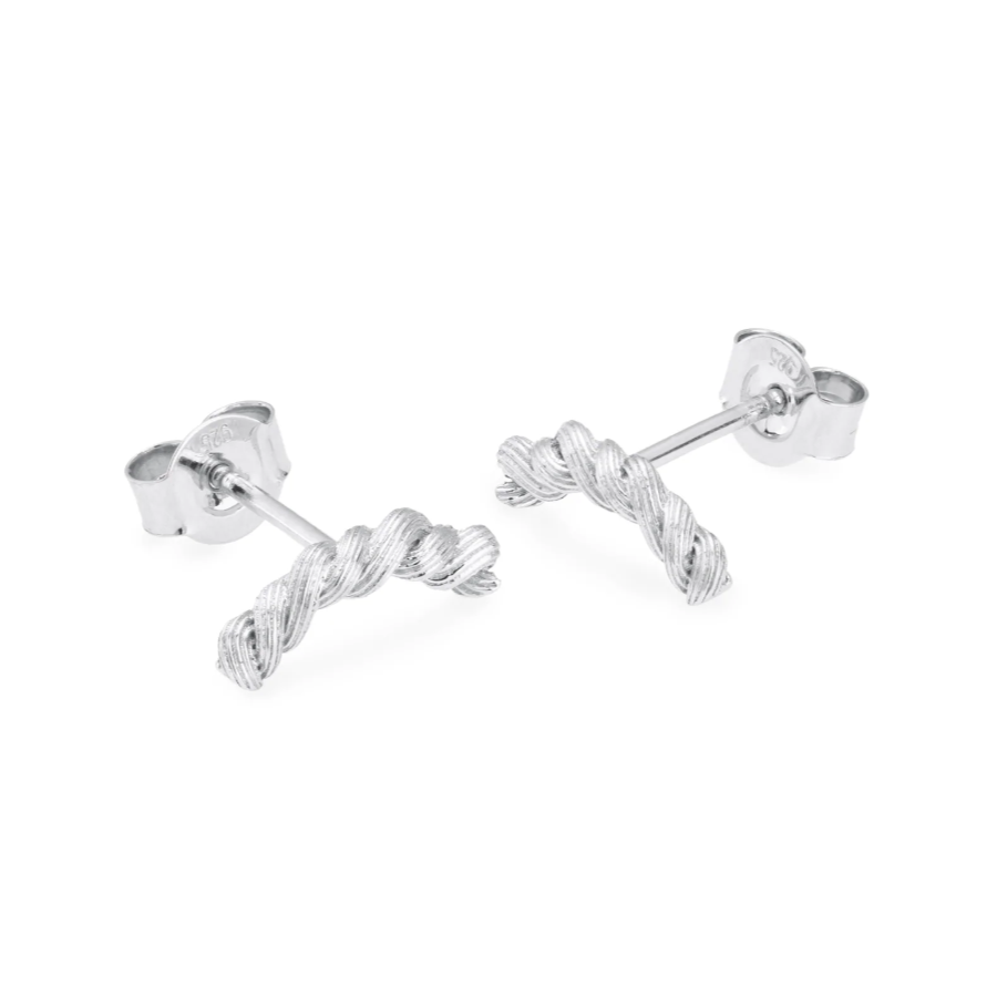 silver braided curved bar stud earrings on white background