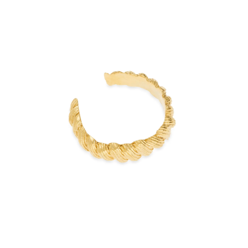 gold braided cuff earring on white background