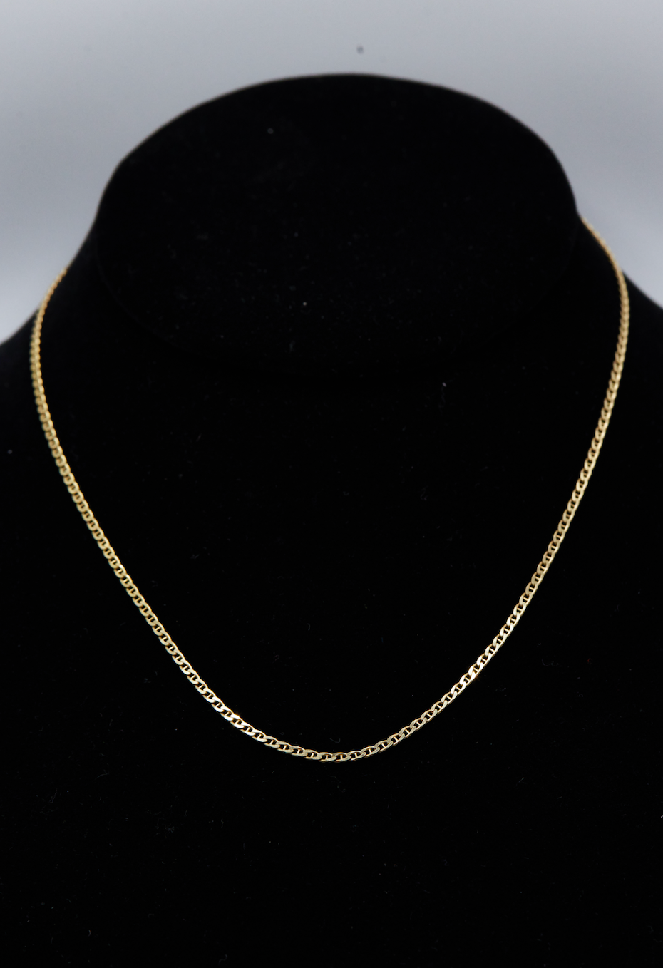Load image into Gallery viewer, 14k mariner chain on black velvet neck form
