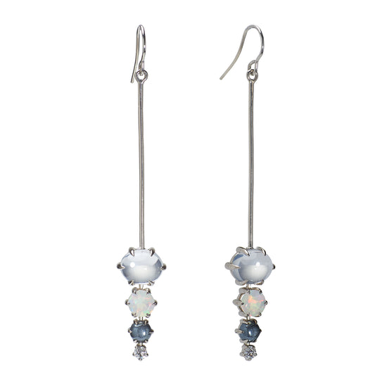 White gold gemstone drop earrings with moonstone, opal, hematite, and diamond, on white background.