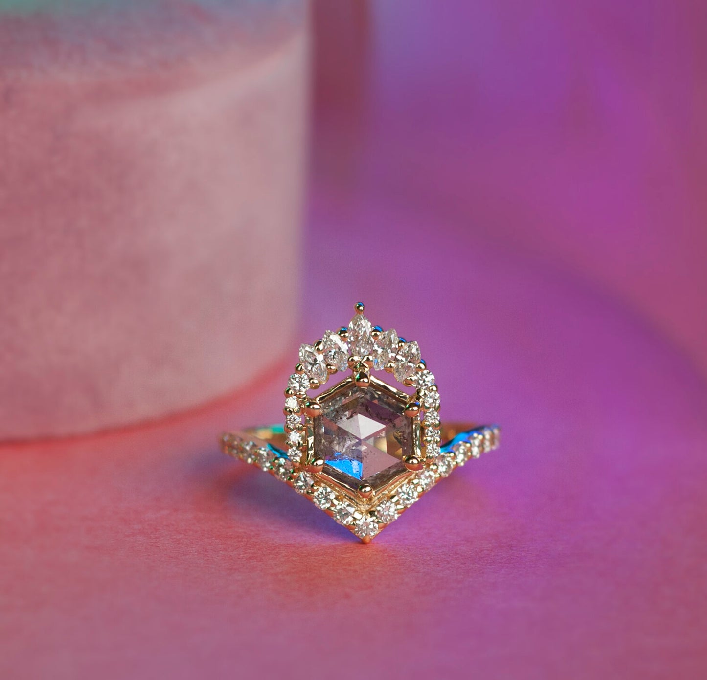 Salt and pepper devoir ring on multi color background.
