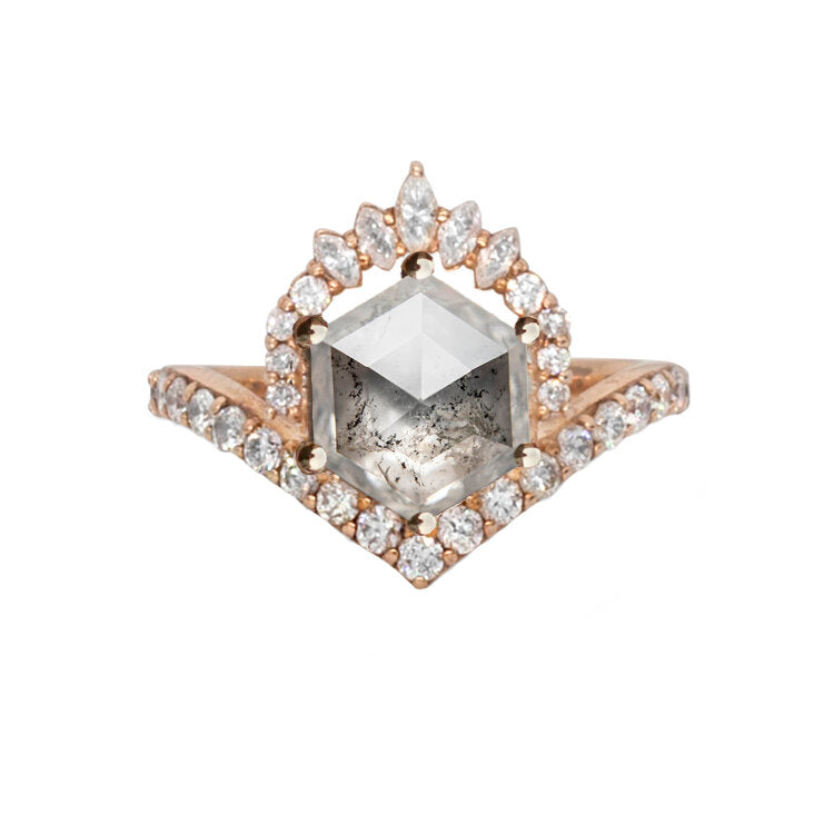 Hexagon salt and pepper diamond with diamond crown and band, close up on white background.