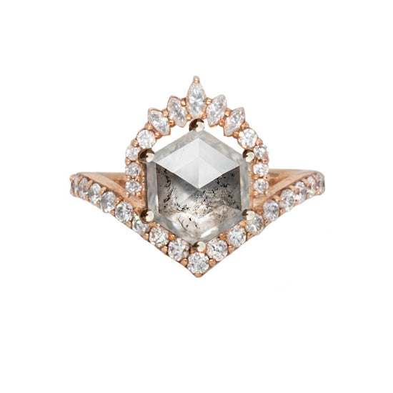 Hexagon salt and pepper diamond with diamond crown and band, close up on white background.