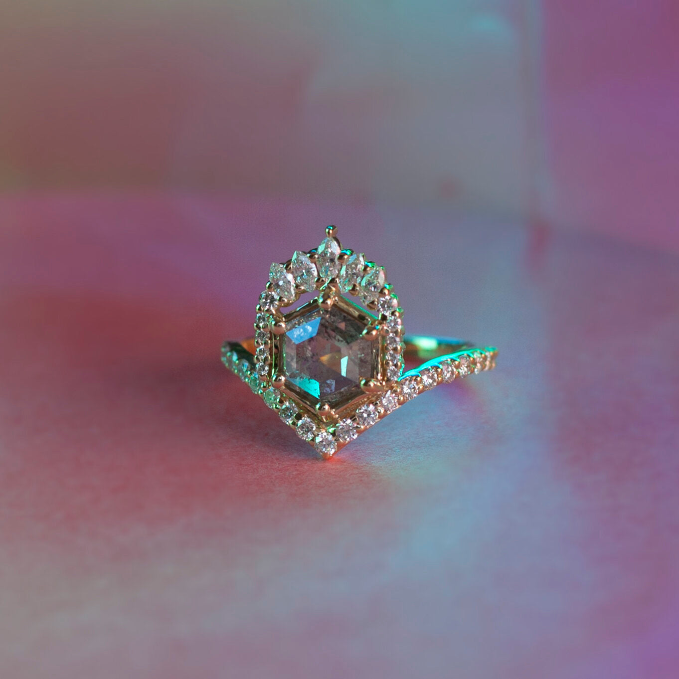 Salt and pepper devoir ring on multi color background.
