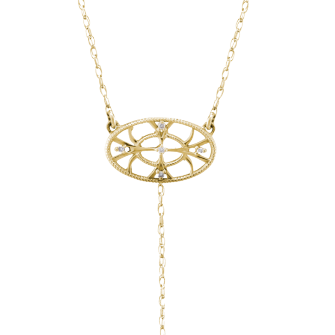 Yellow gold pendant with drop chain photographed on a white background