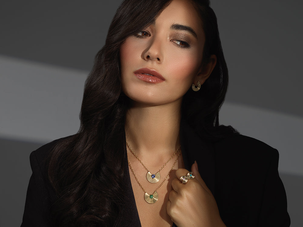 Two large revival necklaces and double revival ring on model.