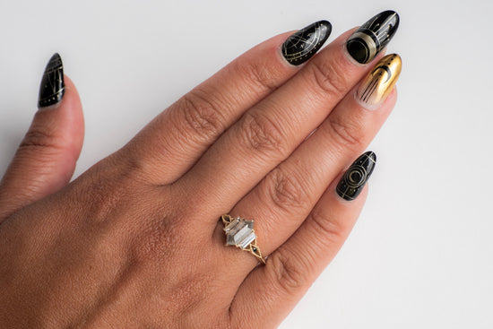 hexagon salt and pepper diamond ring on amodel's hand